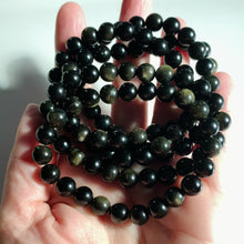 Load and play video in Gallery viewer, Golden Sheen Obsidian Bracelet
